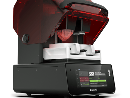 SprintRay dental 3D printer with open red lid printing precise resin dental appliances